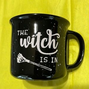 A “ The Witch Is In” Mug with broom 🧹 graphic